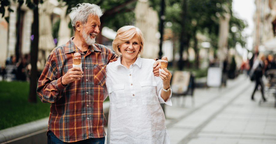 Older couple eating gelato
