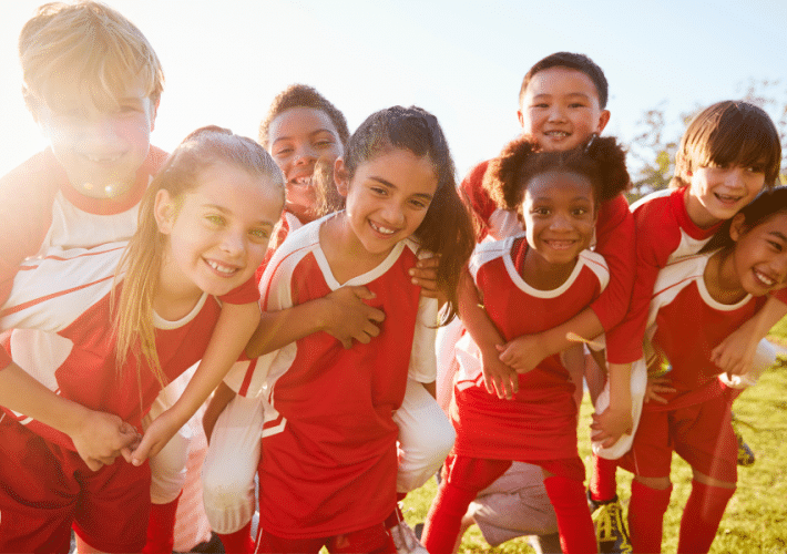 children in soccer uniforms